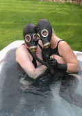 Gasmasked couple in the pool